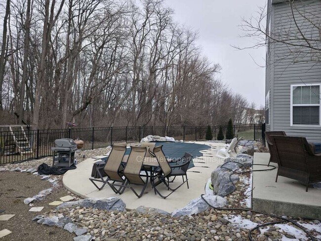 Building Photo - Modern Carlisle Rental with heated inground pool, fireplace, open floor plan, and finished basement