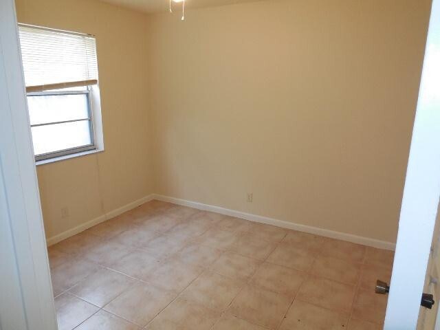 Building Photo - 8393 Royal Palm Blvd