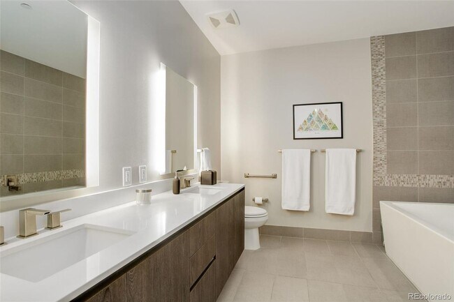 Building Photo - Stunning 2-Bedroom Condo at Sloan's Lake's Premier Lakehouse Community
