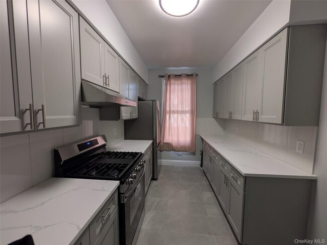 Building Photo - 205-17 Hollis Ave