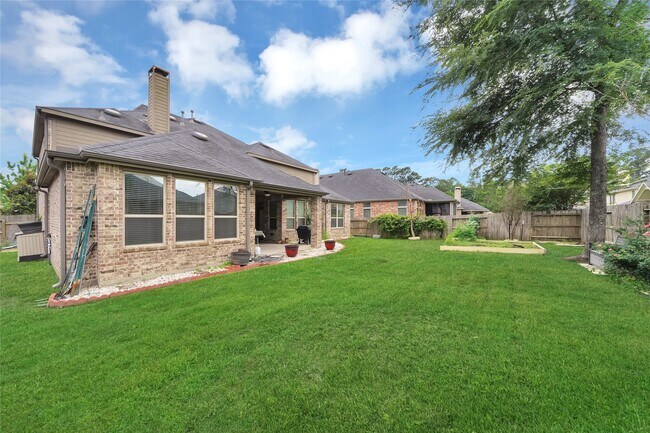 Building Photo - 8115 Spreadwing St