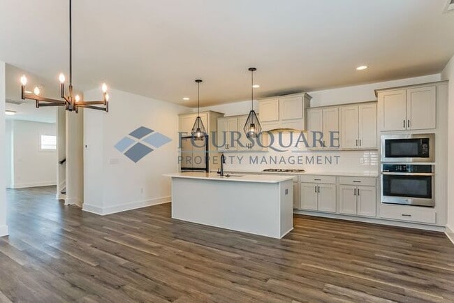 Building Photo - Beautiful 3-Story End-Unit Townhome with Guest Suite, Private Balcony & 2-Car Garage – Wendell, NC