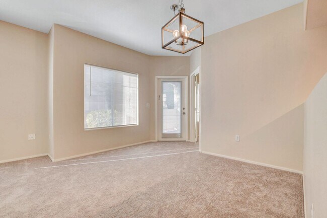 Building Photo - FIRST FLOOR CONDO IN GATED COMMUNITY W/ SINGLE CAR GARAGE