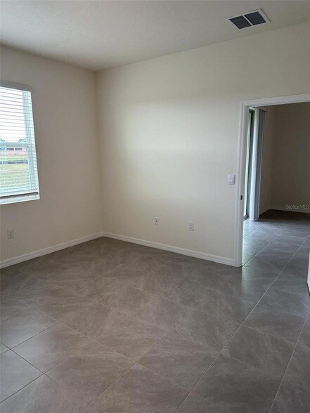 Building Photo - 4078 NW 44th Cir