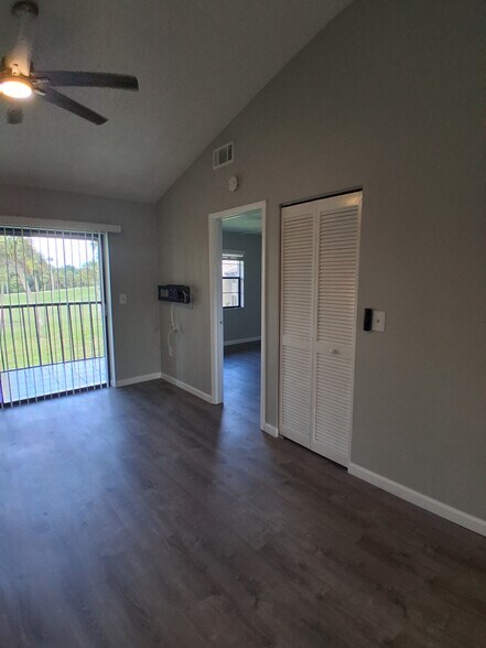 Living room to back master bedroom - 927 Capri Isles Blvd