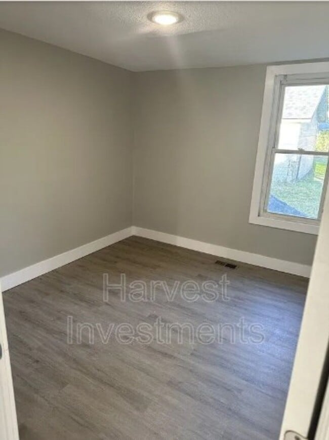 Building Photo - Welcome to Your Next Home with Harvest Investments!