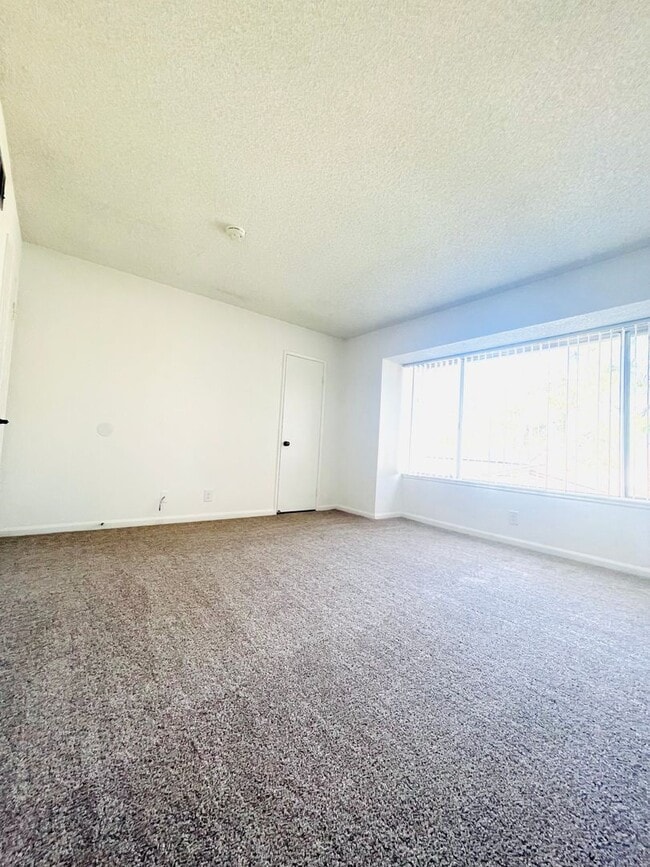 Building Photo - Todd Ranch Condo Welcome to the Todd Ranch Condo, 3-bedroom, 2-bathroom home located in the vibra...