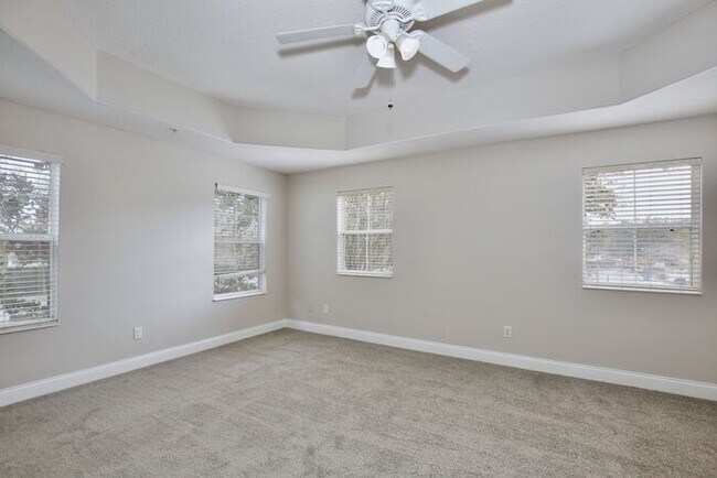 Building Photo - AGENT SHOWINGS ONLY! Stunning 3/2.5 Corner Unit Townhome with a Spacious 2 Car Garage in the Gate...