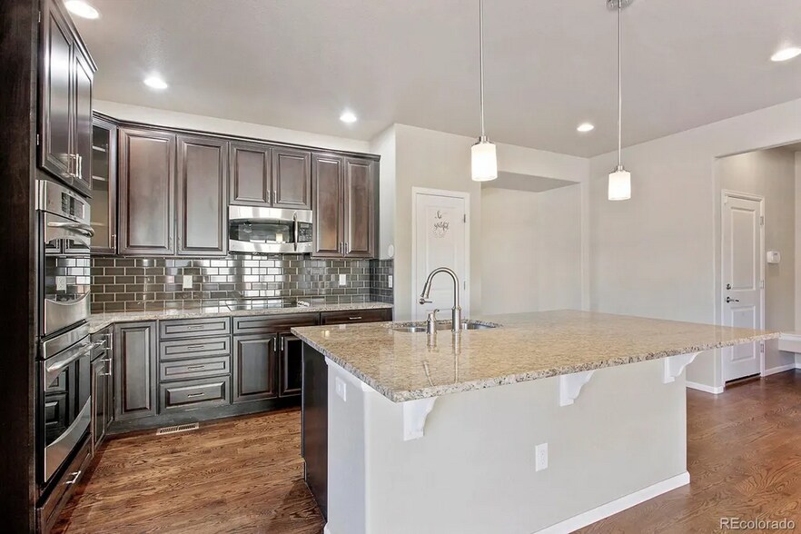 Building Photo - 6343 N Genoa Way