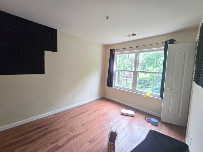 Building Photo - Gated community, 2nd fl condominium with 3...