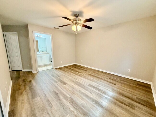 Building Photo - Charming 3BR/2BA Lehigh Acres Duplex with 1-Car Garage | Lawn Care & Salt Service Included