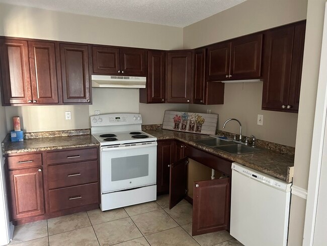 Building Photo - 5666 Encino Cove