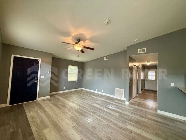 Building Photo - Fully Renovated 2BR Brick Home with Vaulted Ceilings & Backyard Retreat!