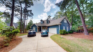Building Photo - Custom Home with Private Boat Dock in Caro...