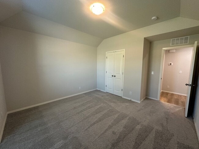 Building Photo - New - 4 bedroom in Bixby - Gated Community