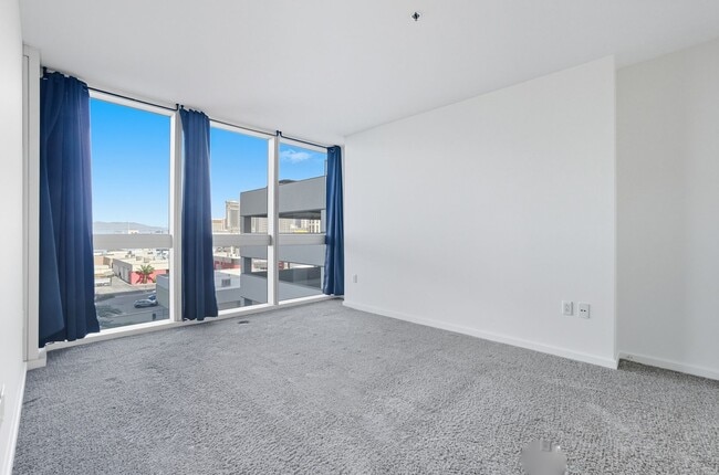 Building Photo - 6th Floor 2-Bedroom Condo with Stunning La...