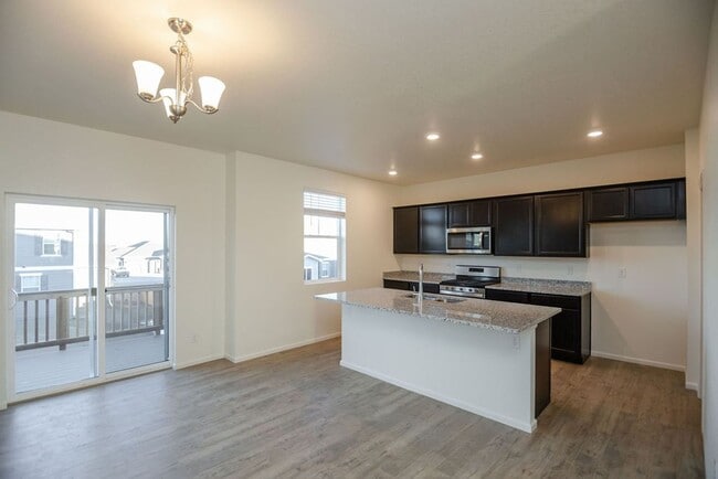 Building Photo - Spacious 4-Bedroom Home with 3-Car Garage & Walk-Out Basement | Prime Living Opportunity