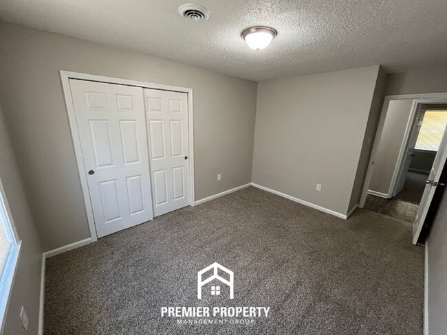 Building Photo - Charming 3BR/2BA in 38118 | Gleaming Hardwood Floors, Dining Area & Huge Yard
