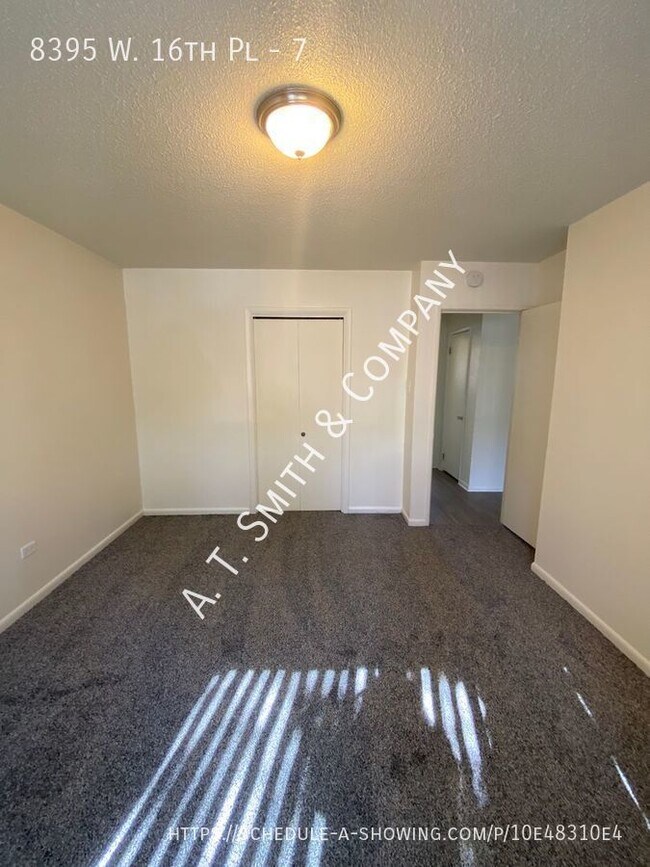 Building Photo - 8395 W 16th Pl