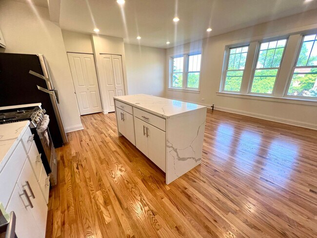 Building Photo - Brand New Renovation! 3 BR/ 2 BA On Quiet ...