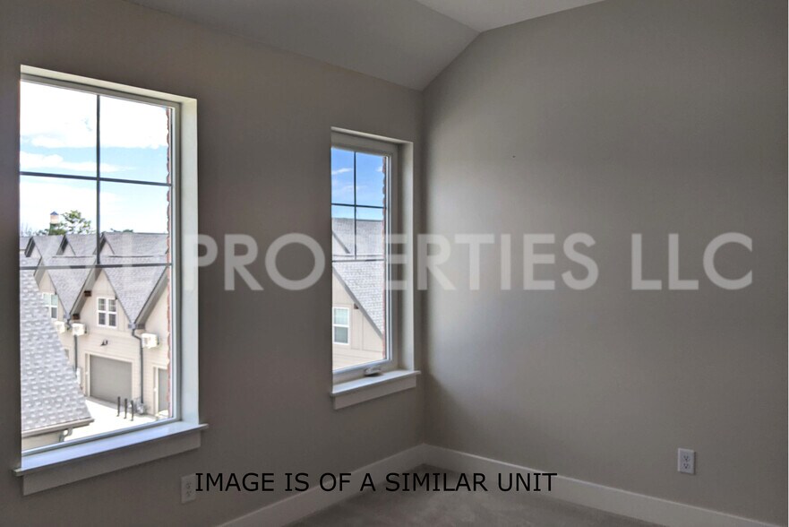 Building Photo - 8059 W 52nd Dr