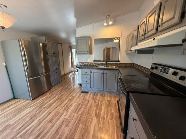 Building Photo - Peaceful 2-Bedroom with Den Home on Over a...