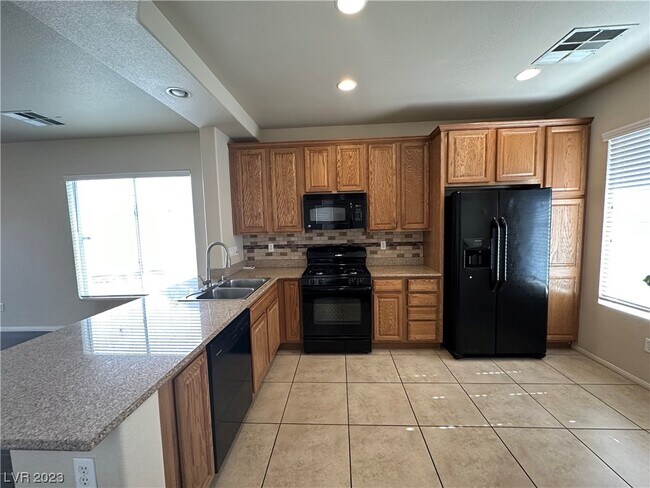 Building Photo - 10434 Amber Night St