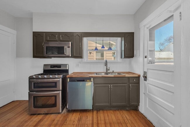 Building Photo - NORWOOD – Stunning Old-World Charm with Modern Comforts