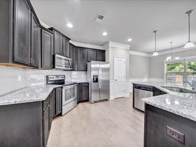 Building Photo - Spacious 4BR Home with Fenced Yard & Community Pool