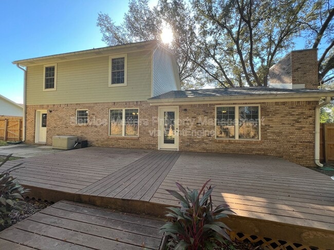 Building Photo - 6004 Players Pl