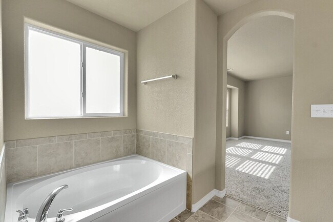 Building Photo - $2,490.95 - 4 Bed, 2.5 Bath Home in CO Springs with Fenced in Yard and 3 Car Garage!