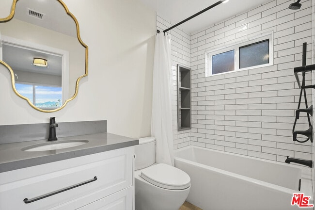 Building Photo - 4762 Charters Ave