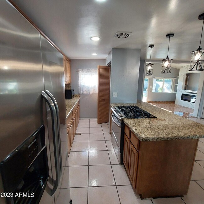 Building Photo - 1636 N 64th Dr