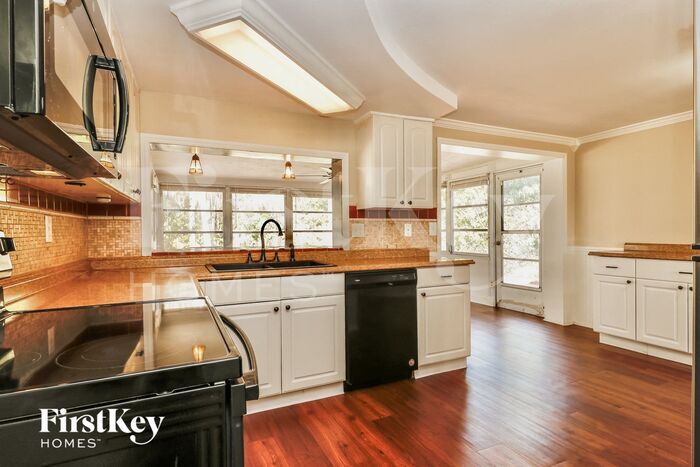 Building Photo - 4125 Woodsville Dr