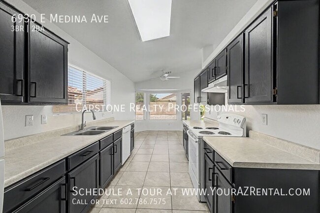 Building Photo - 6930 E Medina Ave