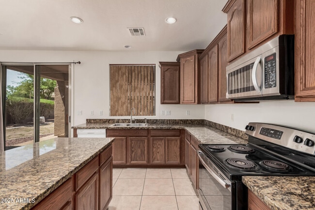 Building Photo - 7352 W Valencia Dr