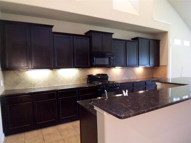 Building Photo - You must see this Stunning 2 story Townhou...