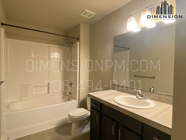 Building Photo - Spacious 4 Bed, 2.5 Bath Home with Garage ...
