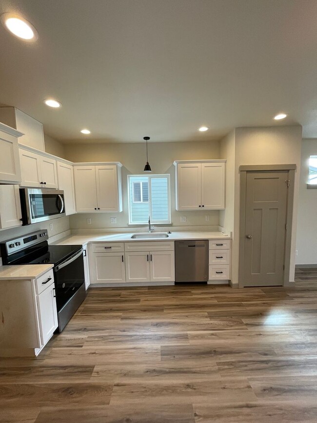 Building Photo - NEW HOME WITH RV PARKING! COME SEE YOUR NE...