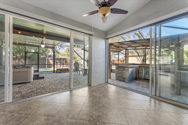Building Photo - A vibrant 2-bedroom, 2-bathroom tropical retreat designed for both high-energy entertaining and l...
