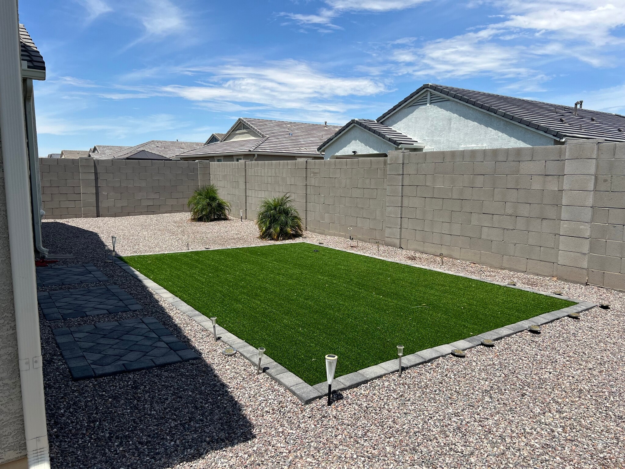 Low maint back yard. Year round green turf - 37640 W San Sisto Ave