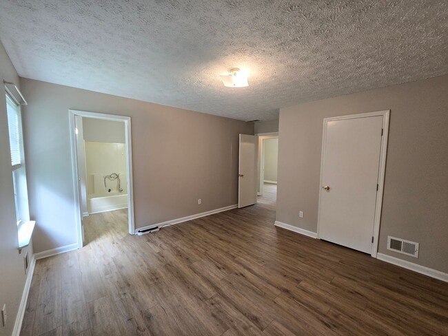 Building Photo - FOR RENT! Jeffersontown! 3 Bedrooms, 2 Full Bathrooms. $1,599/month. NEWer Paint, NEWer Hardwood ...