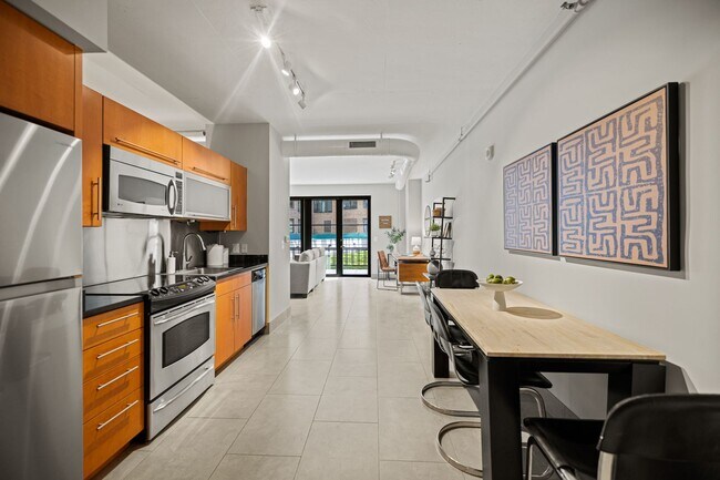Building Photo - Logan Circle Condo | 1 Bed | 1 Bath | 885 Sf | Large Private Patio | 1 Garage Parking Space