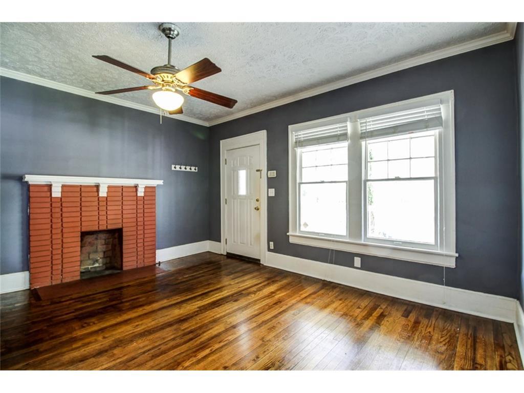 Front Living Room with Antique Coal Burning (Visual only) fireplace. - 182 2nd Avenue Southeast
