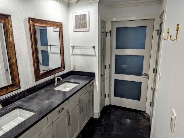 dual sinks, linen closet and leathered granite countertops in bathroom - 4414 Cedar Springs Rd