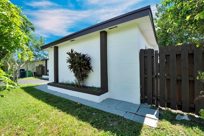 Building Photo - Sunrise Gem: Updated 2-Bed, 2-Bath with Garage Parking