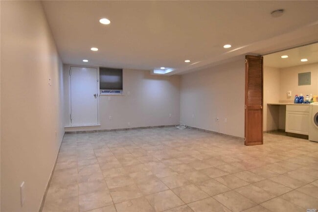 Building Photo - 210-15 42nd Ave