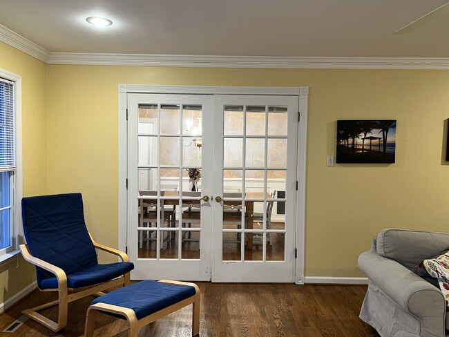 Sun Room view towards dining room - 141 Players Ct