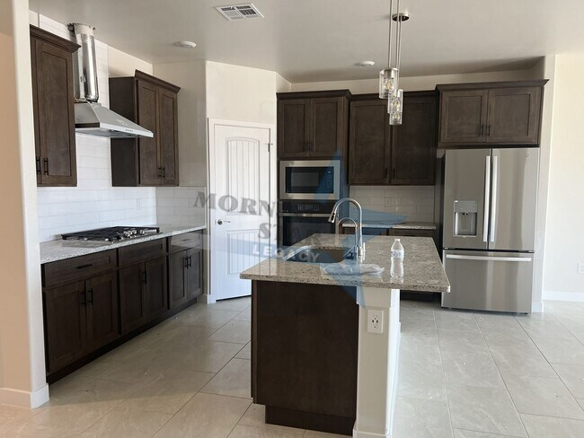 Building Photo - Stunning 2025-built rental in highly desirable Sonoma Ranch — 4 bed / 3 bath