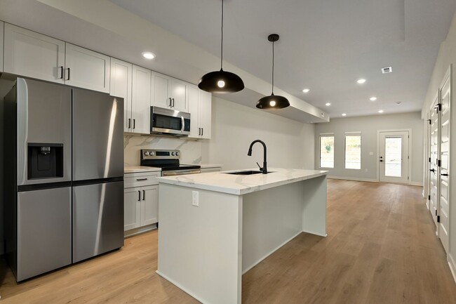 Building Photo - Brand New 2-Bedroom Townhome w/ Unfinished...